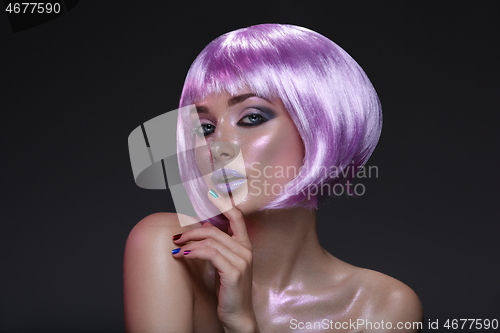 Image of Beautiful girl in purple wig