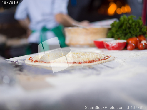 Image of raw pizza margarita