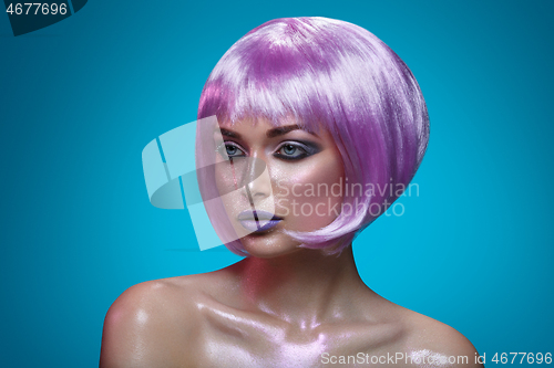 Image of Beautiful girl in purple wig