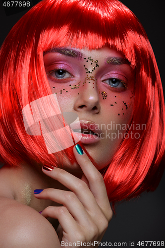 Image of Beautiful girl in red wig