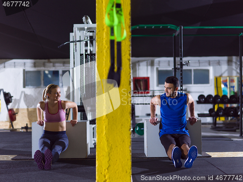 Image of athletes working out their arms
