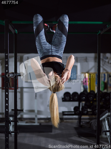 Image of woman doing abs exercises