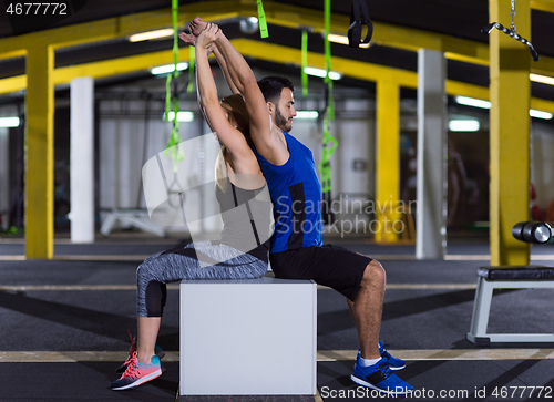 Image of athletes working out their arms