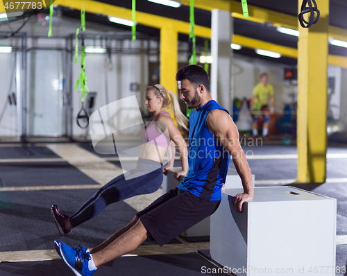 Image of athletes working out their arms