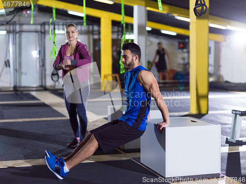 Image of athletes working out their arms