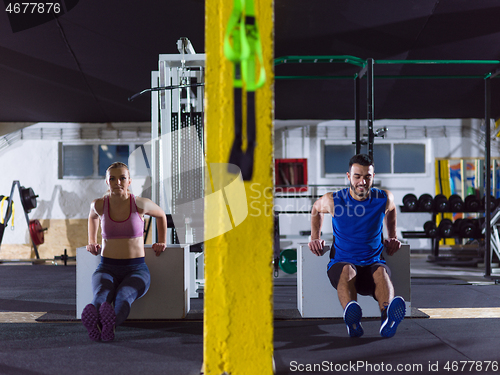 Image of athletes working out their arms