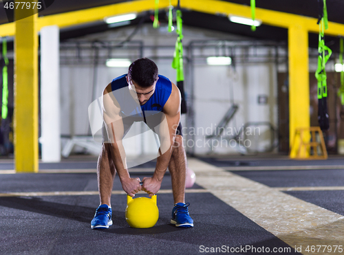 Image of man exercise with fitness kettlebell