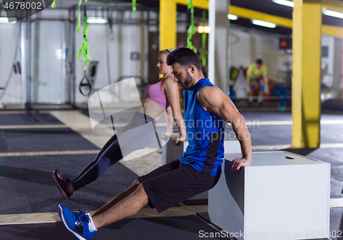 Image of athletes working out their arms