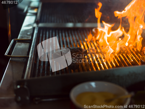 Image of beef steak on the grill