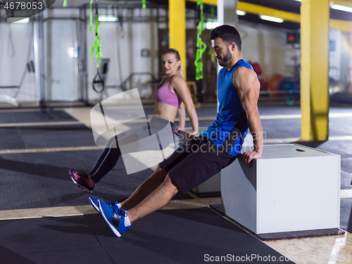 Image of athletes working out their arms
