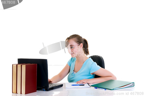 Image of Teenager girl on desk