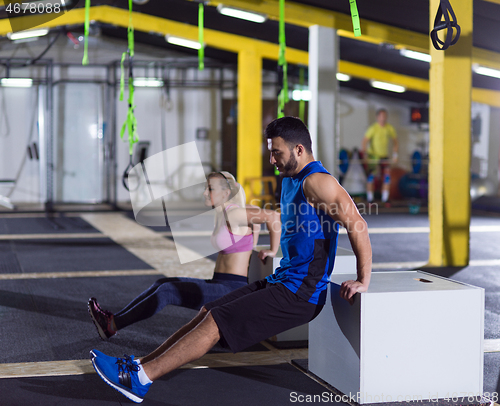 Image of athletes working out their arms