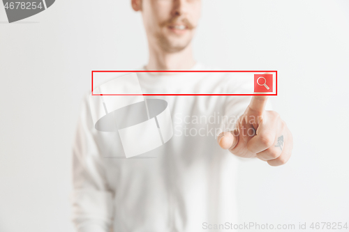 Image of Businessman hand touching empty virtual screen