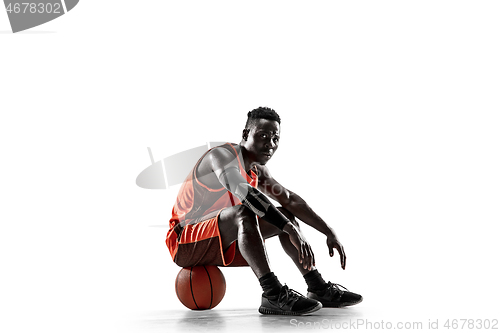 Image of Full length portrait of a basketball player with ball