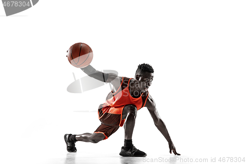 Image of Full length portrait of a basketball player with ball