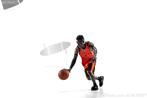 Image of Full length portrait of a basketball player with ball