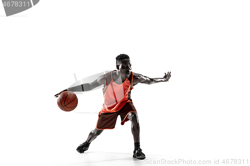 Image of Full length portrait of a basketball player with ball