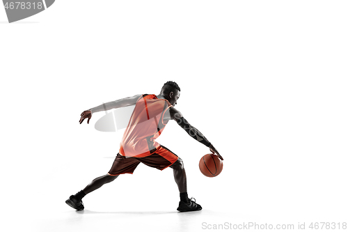 Image of Full length portrait of a basketball player with ball