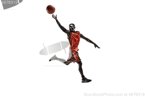 Image of Full length portrait of a basketball player with ball