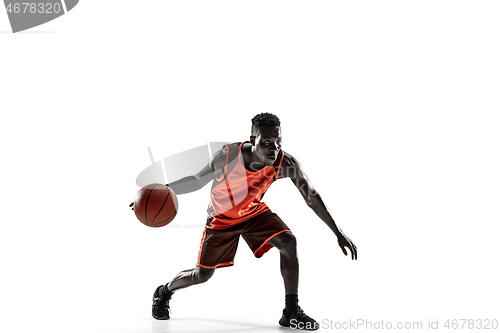 Image of Full length portrait of a basketball player with ball