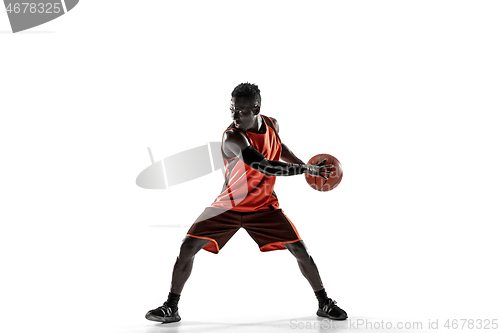 Image of Full length portrait of a basketball player with ball