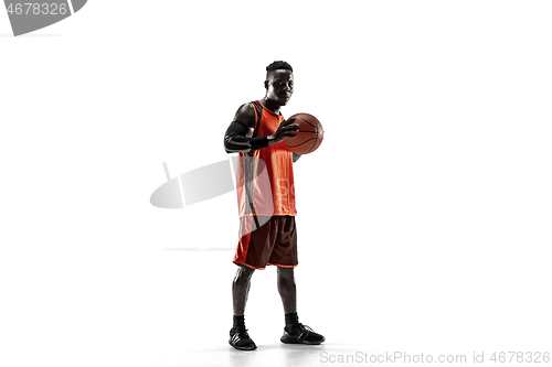 Image of Full length portrait of a basketball player with ball