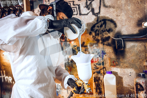 Image of Master painter in a factory