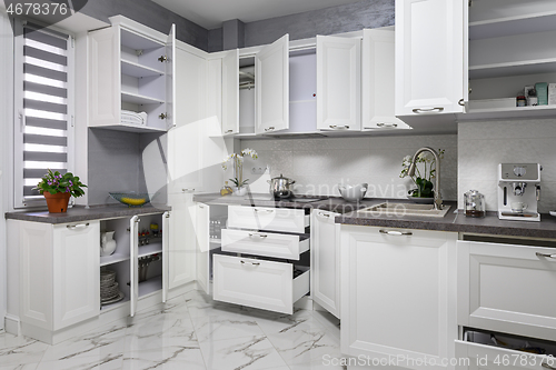 Image of Minimalistic modern white kitchen interior details