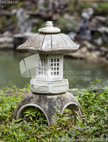 Image of Stone buddhist lamp in japanese garden