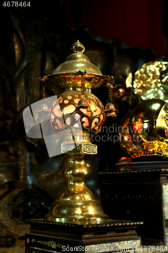 Image of Gild lamp in a buddhist Temple, Vietnam