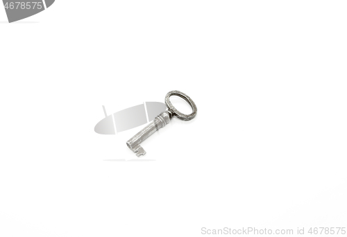 Image of Vintage silver key on white background