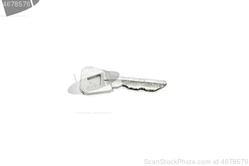 Image of Old key with a triangular hole on white background