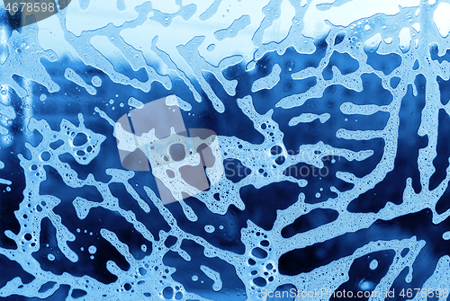 Image of Soap foam pattern on glass