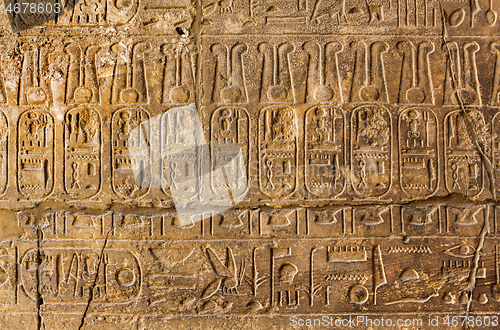 Image of Ancient stone column with Egyptian hieroglyphs