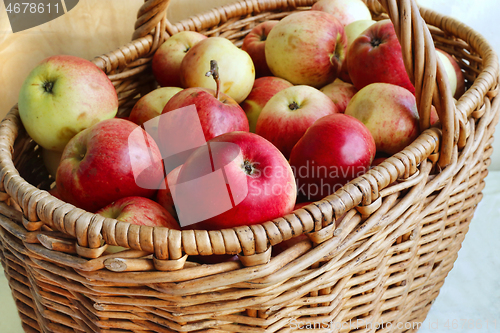 Image of Close-up of bright ripe apples in a basket