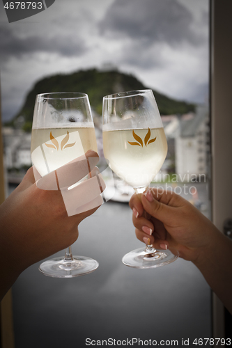 Image of Holding a glass of Champagne