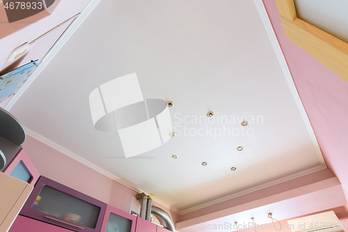 Image of Stretch matte ceiling in the interior of the kitchen, the light is off
