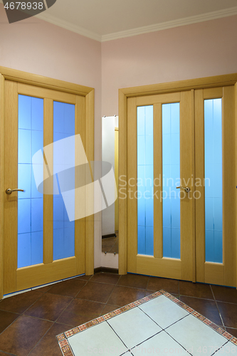 Image of Closed glass interior doors, view from the corridor