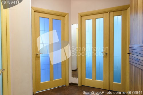 Image of View from the corridor to the interior doors in a one-room apartment