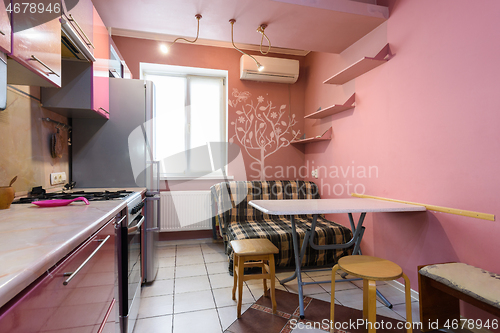 Image of Modern nice habitable kitchen of a small small apartment