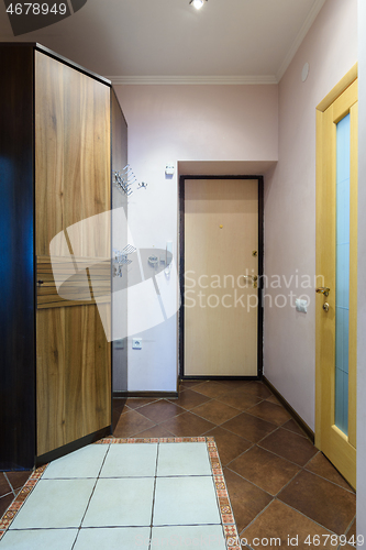 Image of The interior of the corridor in the apartment, view of the front door