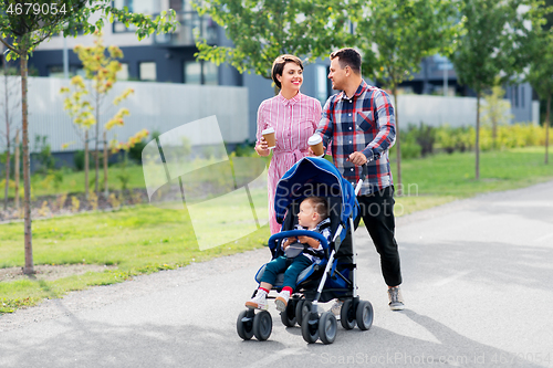 Image of family with baby in stroller and coffee in city