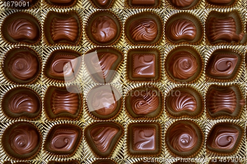 Image of Open box of chocolate treets