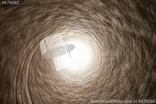 Image of Tube tunnel with bright light in the end