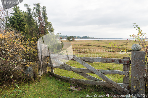 Image of Weathered old wooden gate