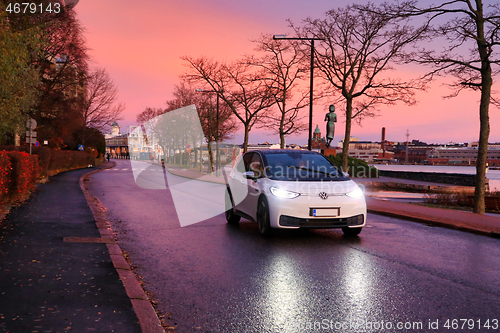 Image of Vokswagen ID3 electric car driving on beautiful morning