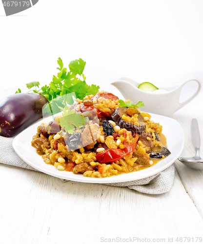 Image of Rice with vegetables and chicken in plate on white board