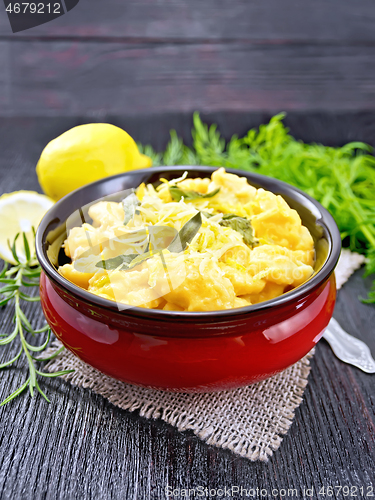 Image of Gnocchi pumpkin with sage in bowl on board