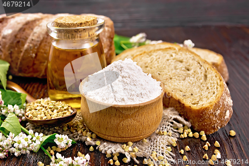 Image of Flour buckwheat green in bowl with bread on board