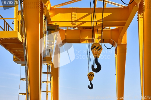 Image of Crane with hooks hanging